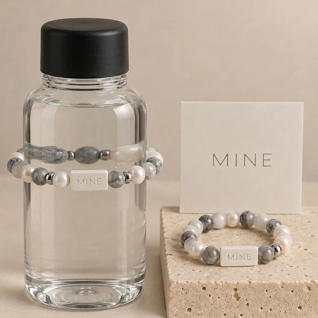 Moonstone — Pearl / Gray marbling; MINE. bottle band design visualization